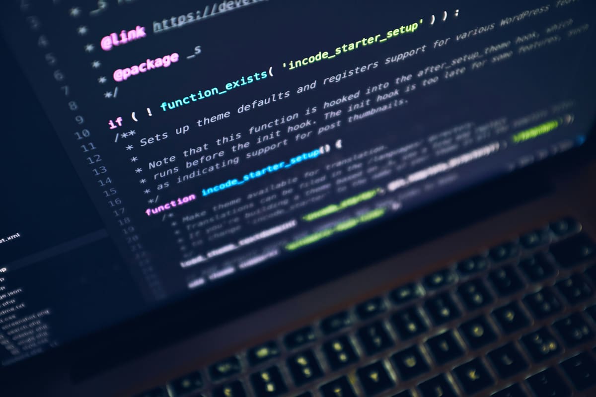 Close-up of code on a keyboard, representing ongoing site maintenance